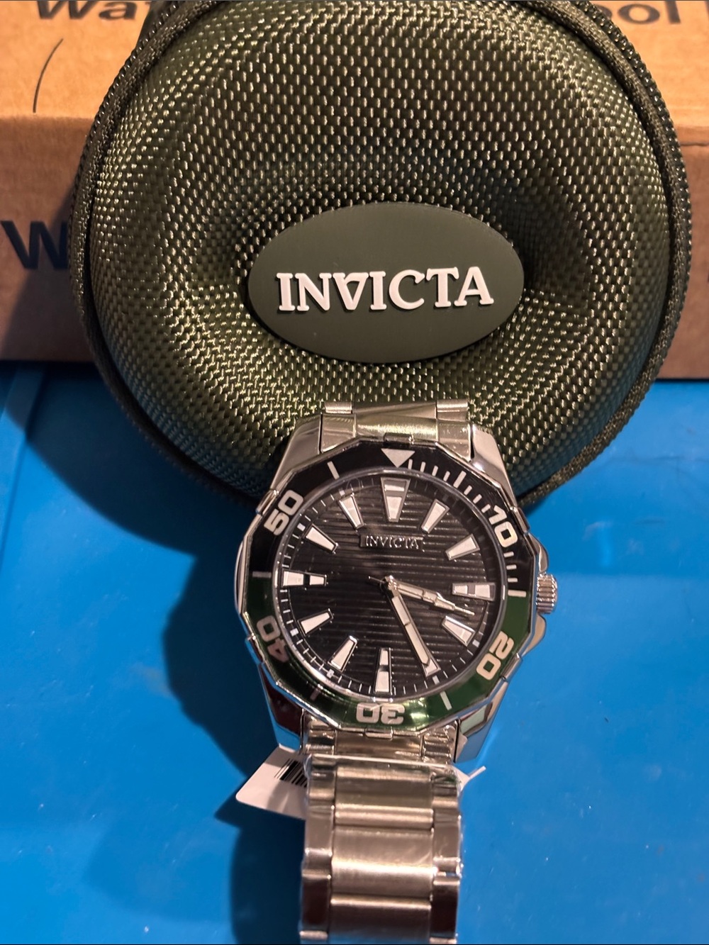 Invicta Silver Stainless Steel Watch with Black Dial and Green Bezel Accent